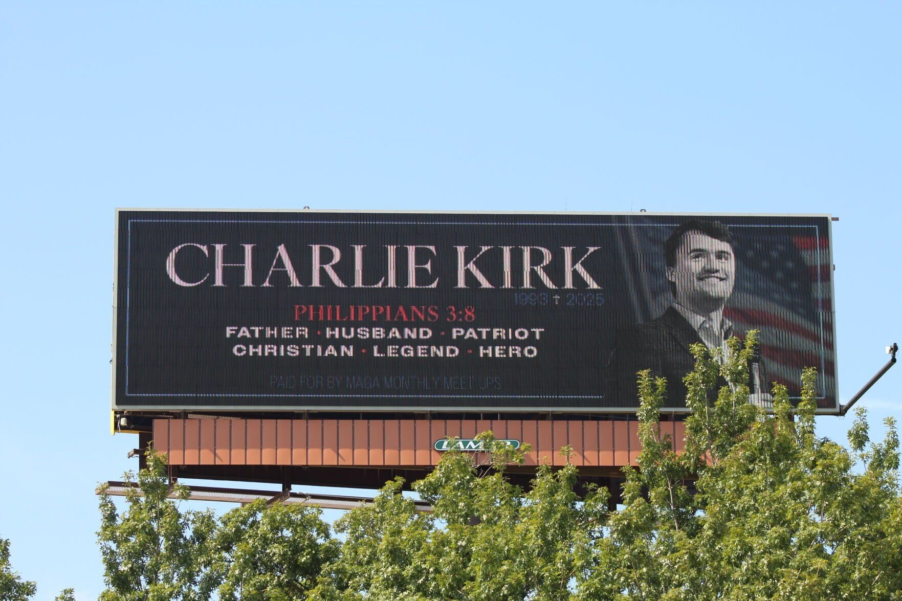 Vandalism of Charlie Kirk Memorial Billboards Sparks Outrage in Asheville Area