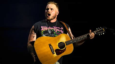 Zach Bryan’s ‘Free Palestine’ T-Shirt Sparks Controversy as Israeli Analyst Prepares to Challenge